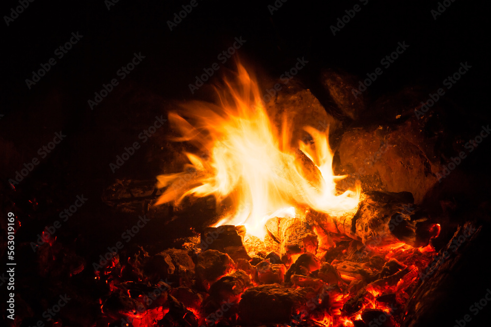 flames of fire, campfire  with stones around