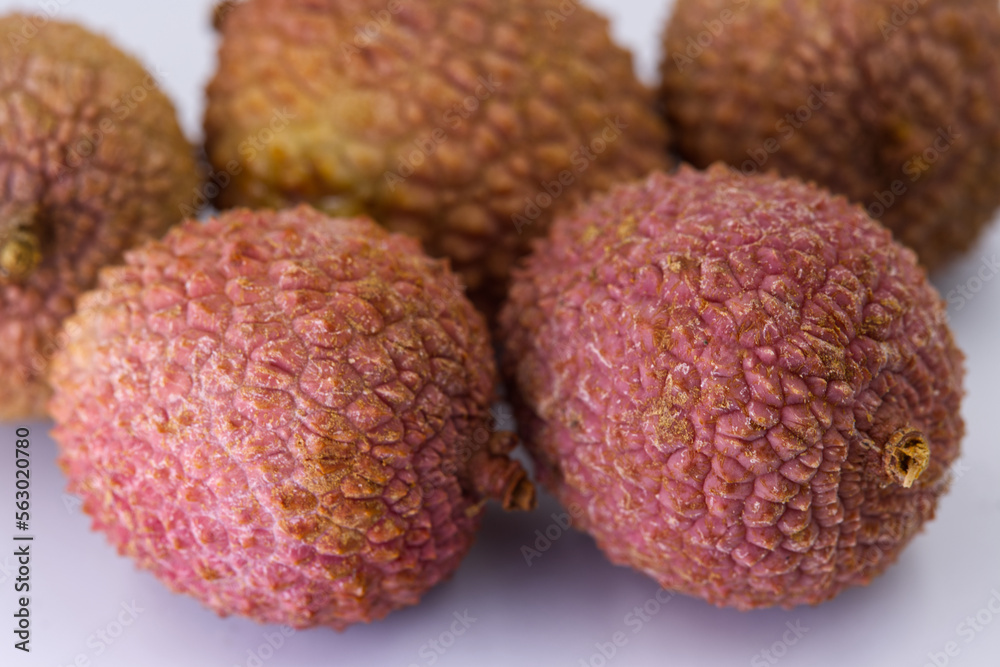 Lichi Fruits on white background. Close-up and selective focus. Lichi Fruits on white background. Close-up and selective focus.