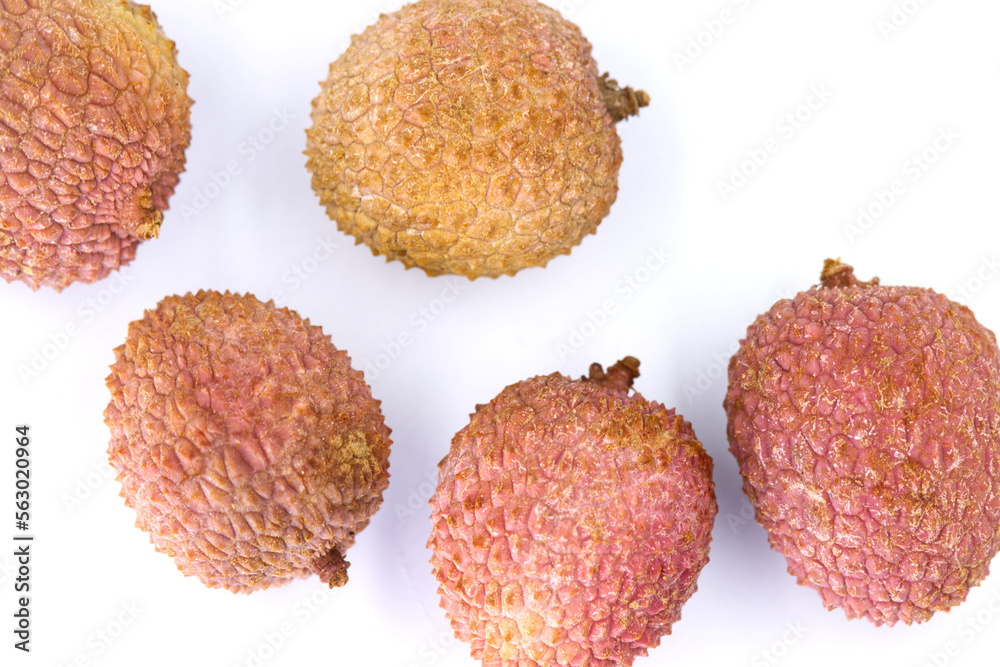 Fresh ripe lychees on white background. Fresh ripe lychees on white background.