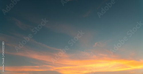 Beautiful bright sunset sky with clouds. Sunset sky background.