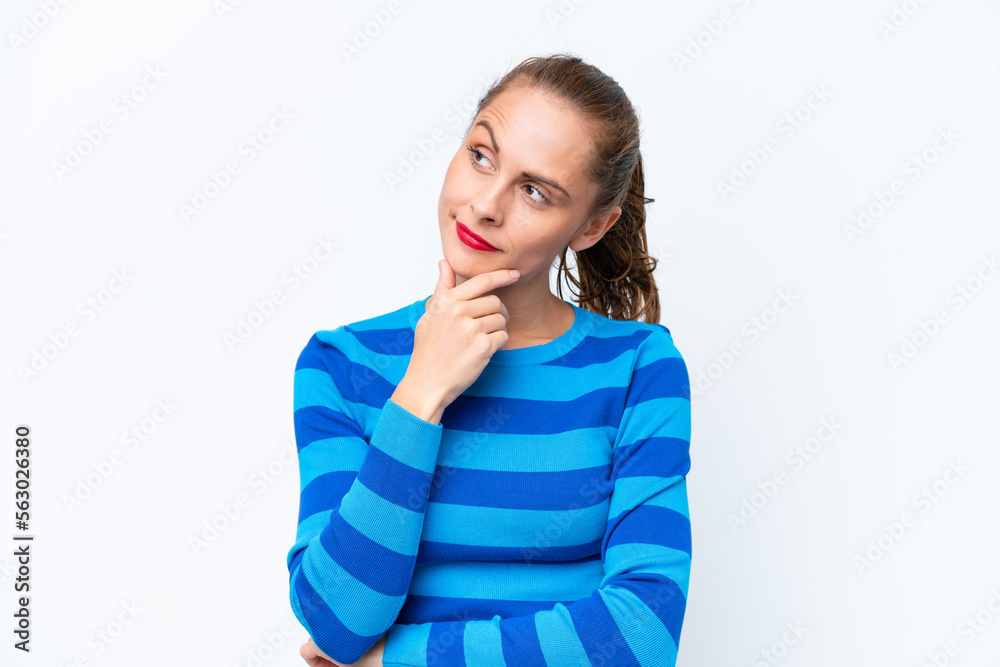 Young caucasian woman isolated on white background and looking up Young caucasian woman isolated on white background and looking up