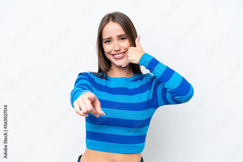 Young pretty caucasian woman isolated on white background making phone gesture and pointing front Young pretty caucasian woman isolated on white background making phone gesture and pointing front