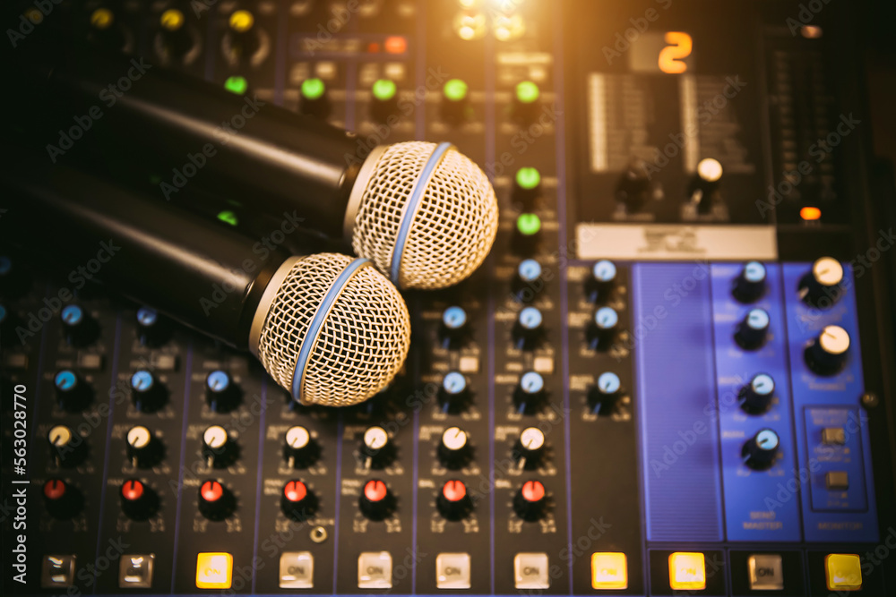 Close-up microphone and sound mixer in studio for sound record control system and audio equipment and music instrument Close-up microphone and sound mixer in studio for sound record control system and audio equipment and music instrument