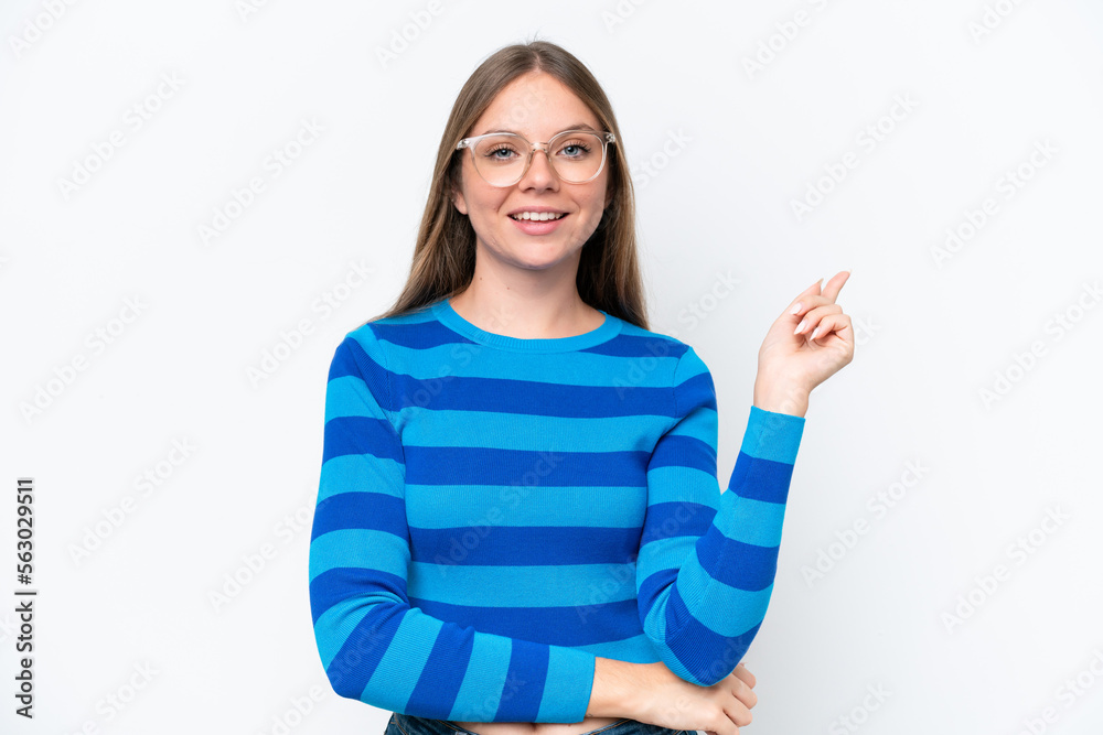 Young beautiful blonde woman isolated on white background happy and pointing up