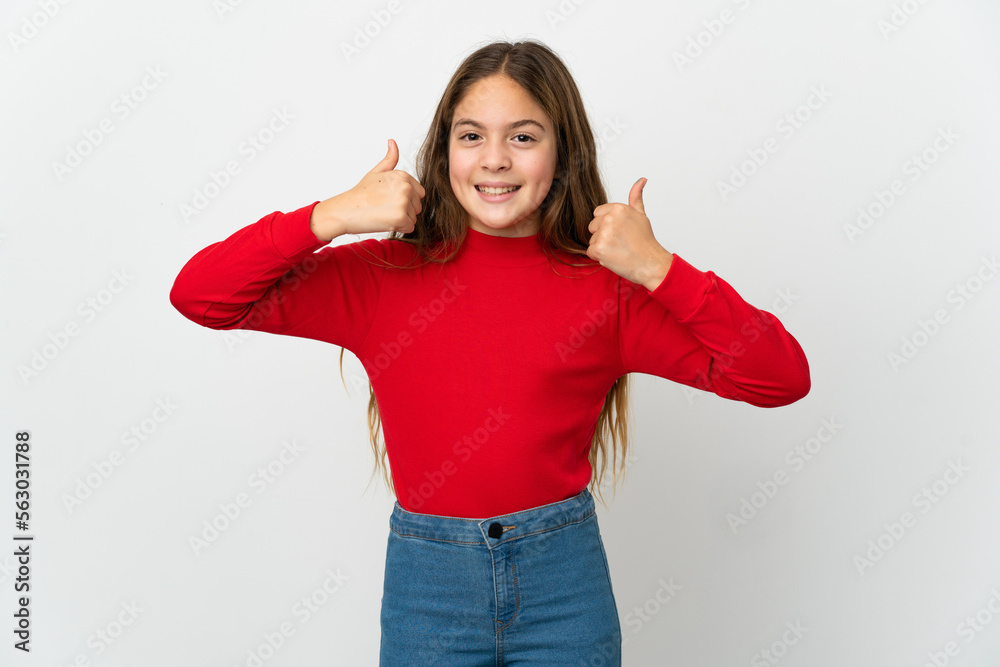 Little girl over isolated white background giving a thumbs up gesture Little girl over isolated white background giving a thumbs up gesture