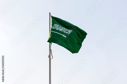 flag of Saudi Arabia against blue sky photo