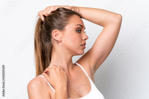 Young caucasian woman isolated on white background touching her hair. Close up portrait