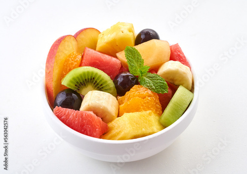 Salad in a bowl  fruits  on white background   