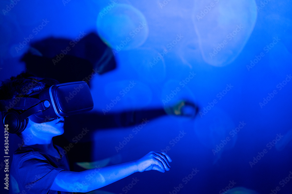 kid experiencing using a virtual reality headset kid experiencing using a virtual reality headset