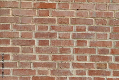 Texture of a whole red brick wall