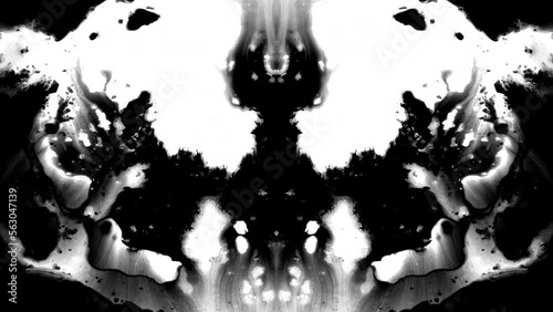 Ink drops rorschach fluid splash splatter spread texture creative abstract background mirror effect	

