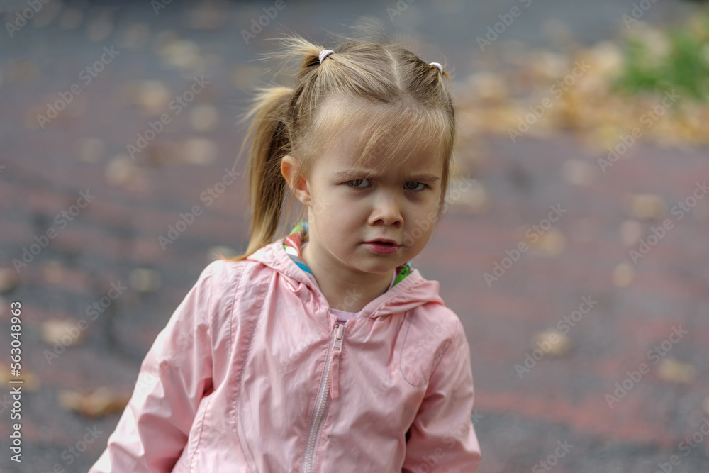 Portrait of a Caucasian girl, with a anger and annoyance expression Portrait of a Caucasian girl, with a anger and annoyance expression