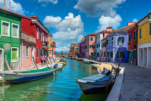 Fototapeta Naklejka Na Ścianę i Meble -  Street with colorful buildings in Burano island, Venice, Italy. Architecture and landmarks of Venice, Venice postcard