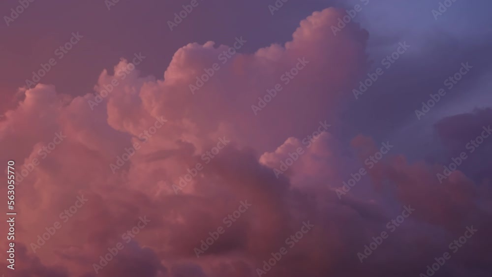Breathtaking Timelapse video of dramatic clouds turning from yellow and grey to pink and dark red. Amazing sunset sky in crimson beams of sun. Film grain pixel texture. Nature climate background.