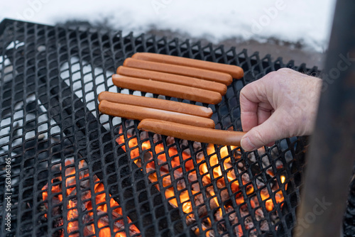 Grilling hotdogs in the winter