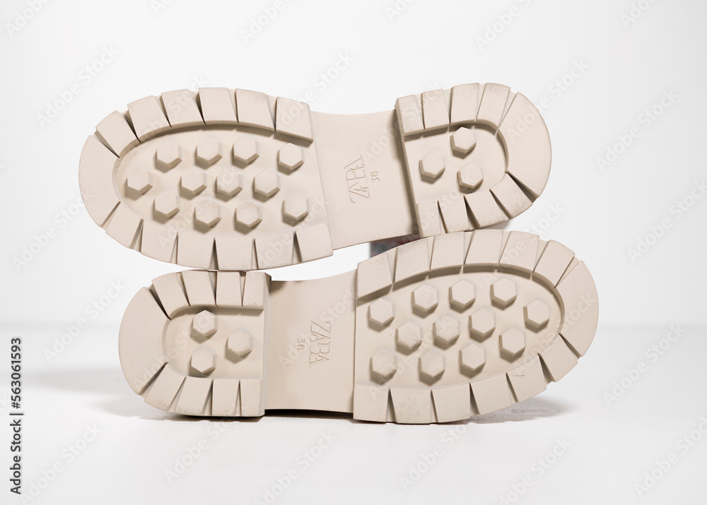 kent,uk 01.01.2023 ZARA cream and vanilla long ankle zip chunky track sole  high fashion boots. On trend catwalk footwear and sneakers. Women high  grade fashion brands. Stock Photo | Adobe Stock