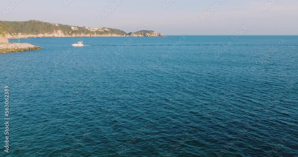 Drone view of the Mexican beaches on the Oaxacan coast at sunset. Huatulco beaches of the Mexican Pacific. paradise sea. Drone view of the Mexican beaches on the Oaxacan coast at sunset. Huatulco beaches of the Mexican Pacific. paradise sea.
