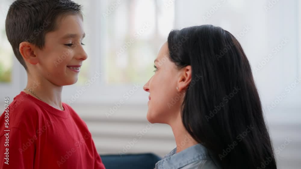 Happy boy having close relationship with his mother, love and trust, family Happy boy having close relationship with his mother, love and trust, family