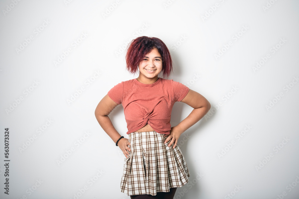 portrait of beautiful American teen over studio background portrait of beautiful American teen over studio background