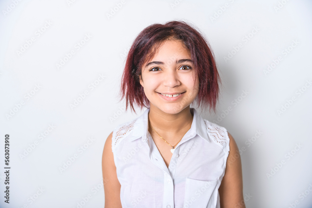 portrait of beautiful American teen over studio background portrait of beautiful American teen over studio background