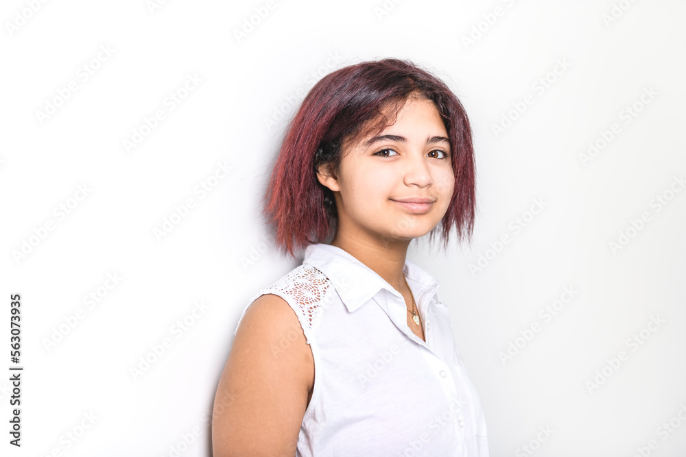 portrait of beautiful American teen over studio background portrait of beautiful American teen over studio background
