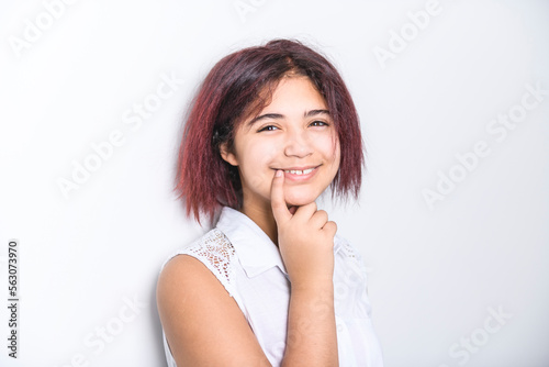 portrait of beautiful American teen over studio background