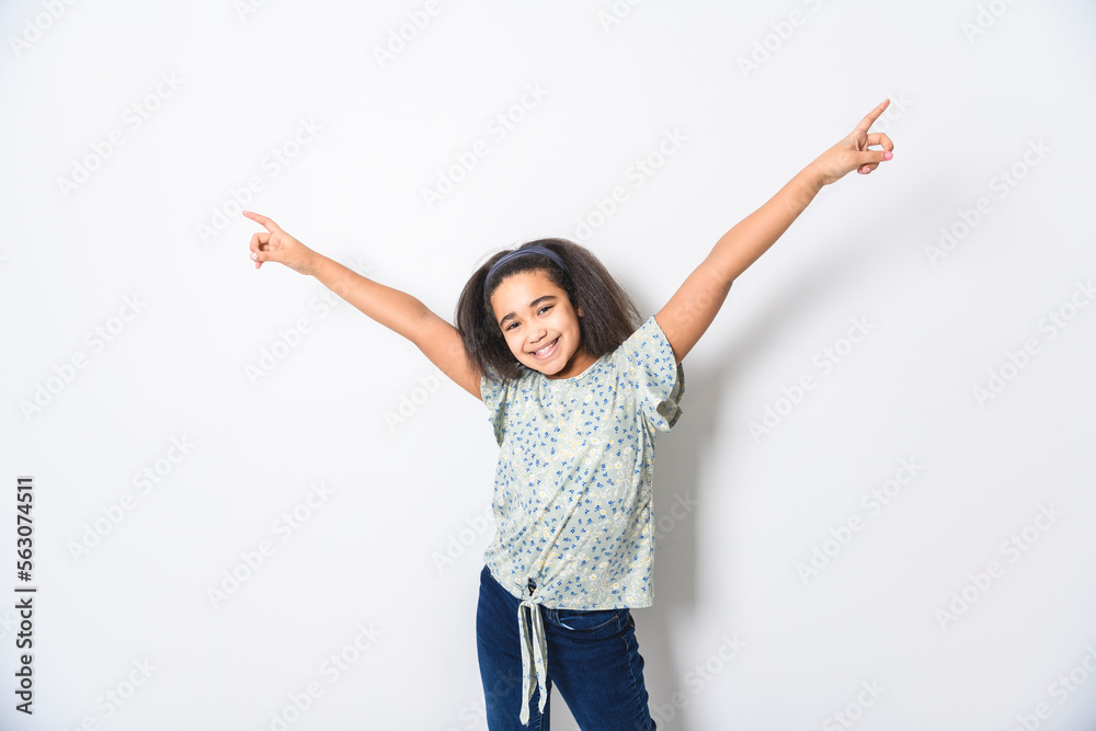 Adorable 9 years child girl on studio white background Adorable 9 years child girl on studio white background