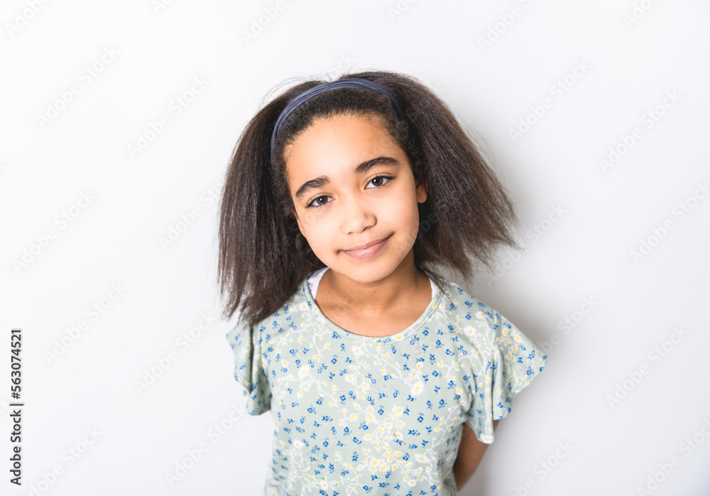 Adorable 9 years child girl on studio white background Adorable 9 years child girl on studio white background