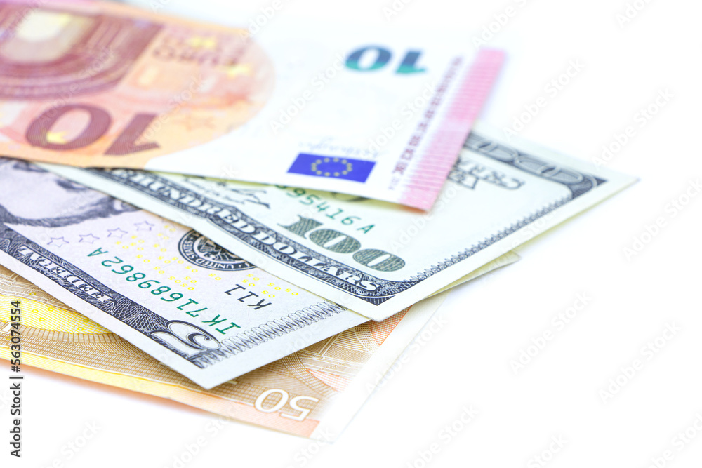 Money isolted on a white background.Euro and dollar banknotes. Copy space. Money isolted on a white background.Euro and dollar banknotes. Copy space.