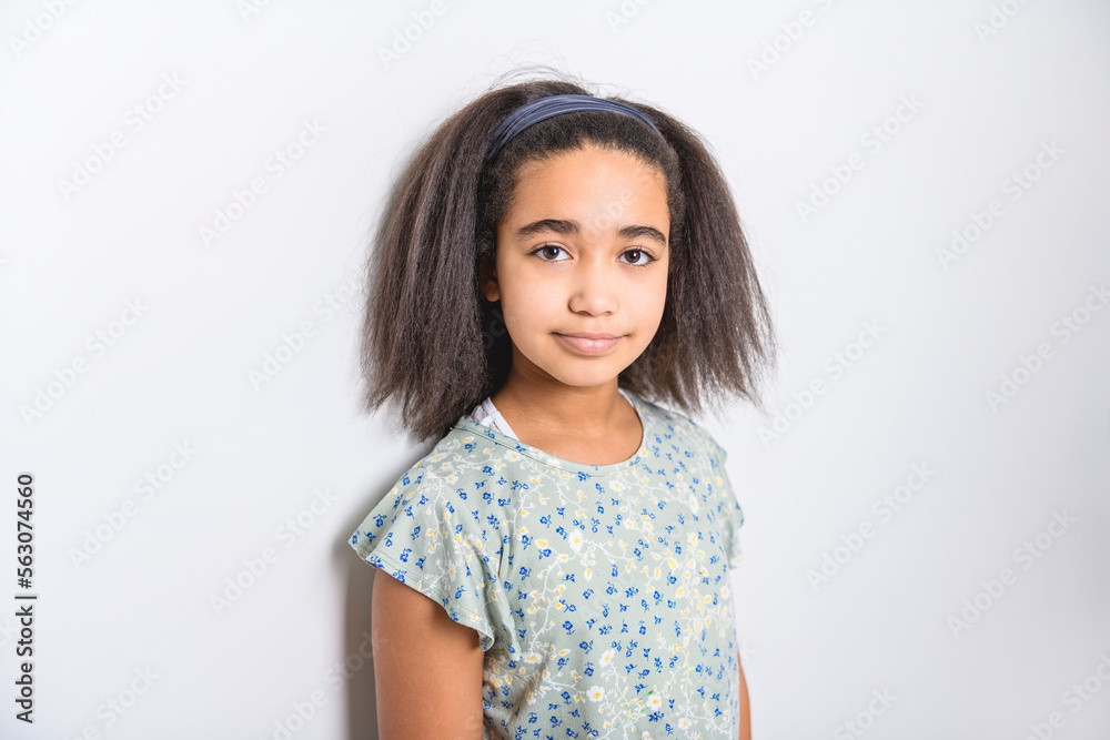 Adorable 9 years child girl on studio white background Adorable 9 years child girl on studio white background
