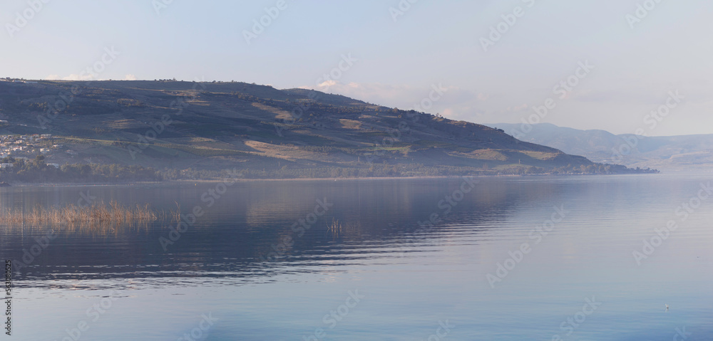 Panorama of Tiberias, Israel. mountain and lake covered with morning mist.