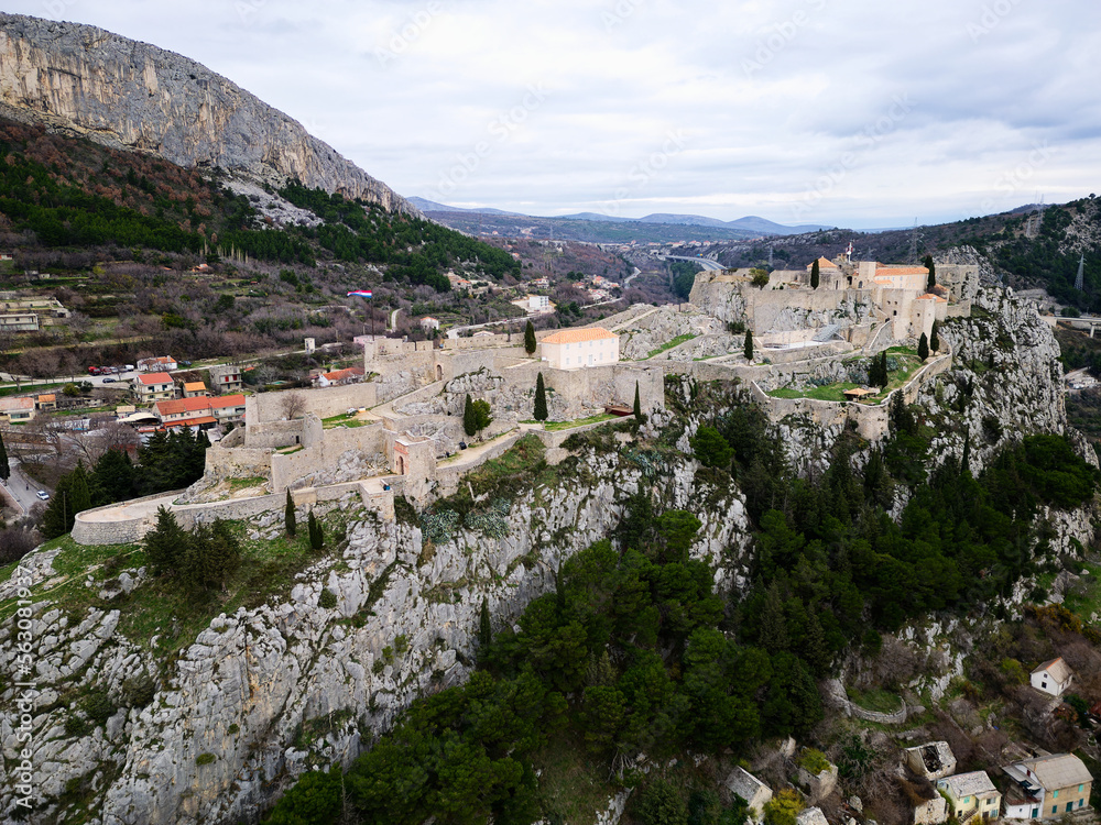 The Klis Fortress is a medieval fortress situated above a village bearing the same name, near Split, Croatia. Places of historic interest. Medieval fortress built into a rocky ridge.