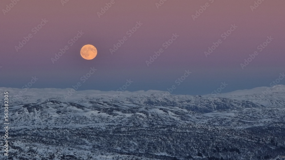 Fototapeta premium full moon over the mountains, Hovden, Norway