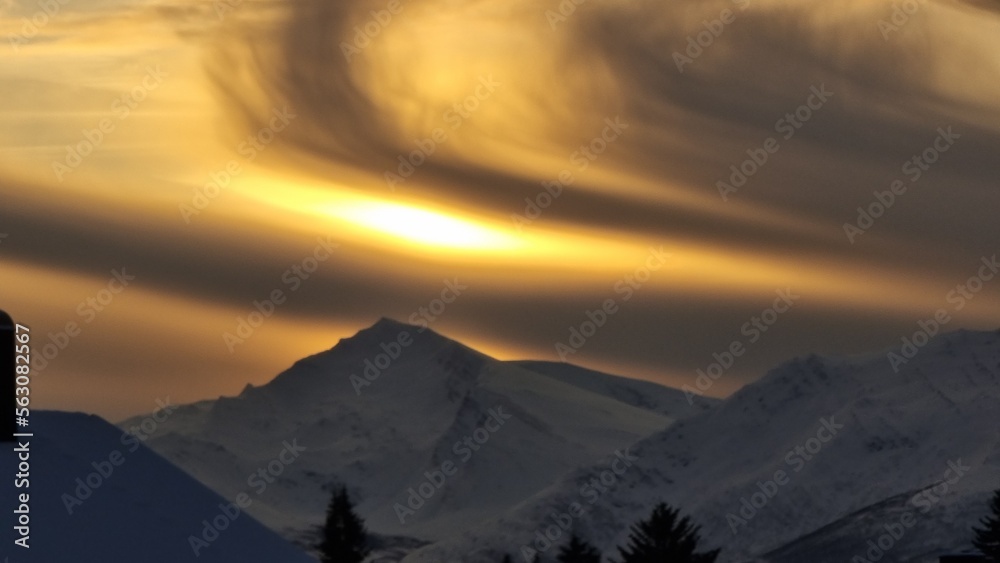 wavy clouds, sunset in the mountains, Tromsø, Norway