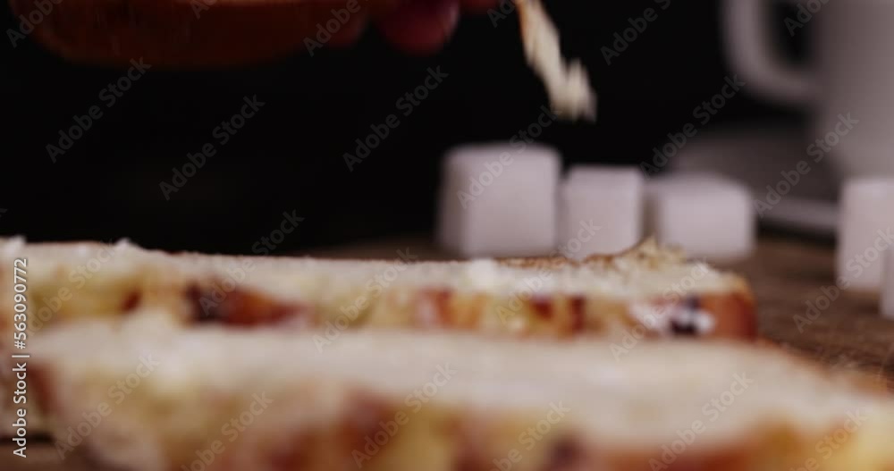 cut a wheat bun into pieces, a wheat bun with a sweet creamy curd filling is cut into portions cut a wheat bun into pieces, a wheat bun with a sweet creamy curd filling is cut into portions