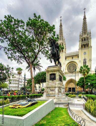 Statue of Simon Bolivar in Parque Seminario (Seminar Park) and the Metropolitan Cathedral of Guayaquil
