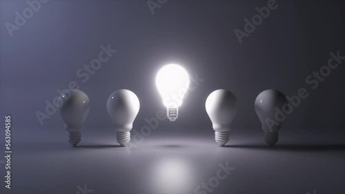 Creative new idea concept with light bulbs.  One light bulb standing out from others bulbs floating on dark background. Business, success, think positive, inspiration, solution symbol. 3D Animation. 