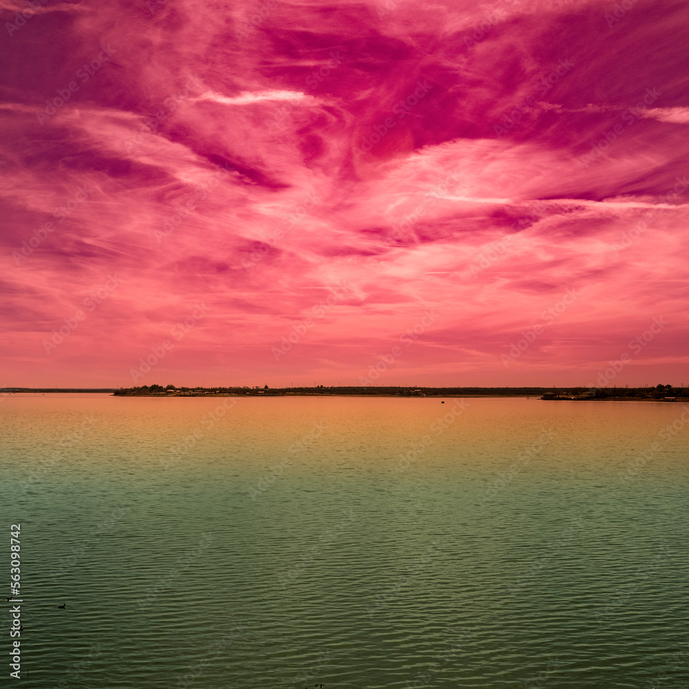 Dramatic saturated sunset landscape of Lake Fort Phantom Hill in Abilene, Taylor and Jones Counties, Texas, USA