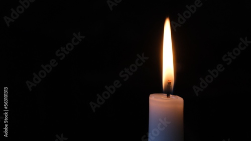 Candle light motionless black background