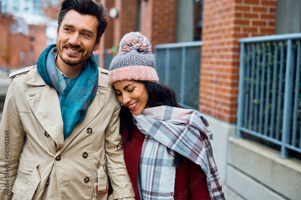 Happy couple in love enjoying in walk on street. Happy couple in love enjoying in walk on street.