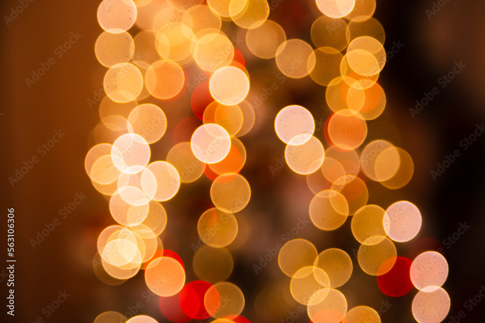 blurred background of lanterns on christmas tree. Christmas bokeh blurred background of lanterns on christmas tree. Christmas bokeh