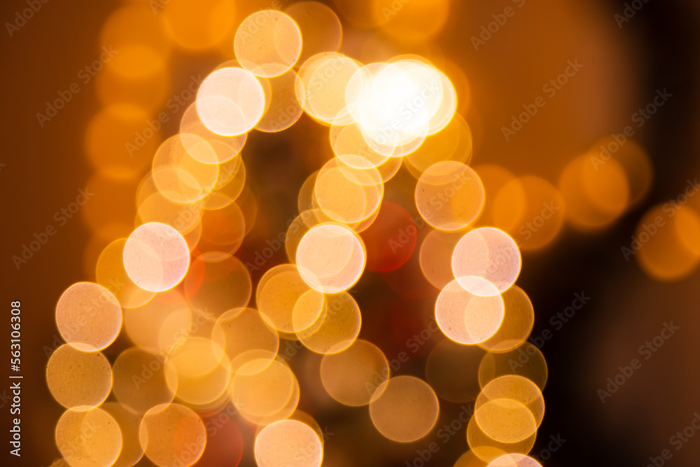 blurred background of lanterns on christmas tree. Christmas bokeh blurred background of lanterns on christmas tree. Christmas bokeh