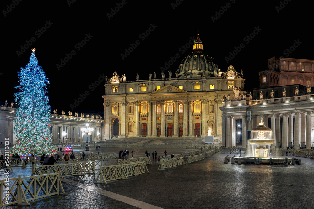 St. Peter's Square illuminated at night and decorated for Christmas.