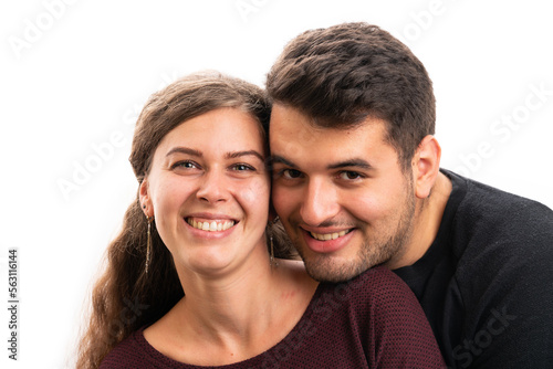 Portrait of boyfriend and girlfriend hugging close-up