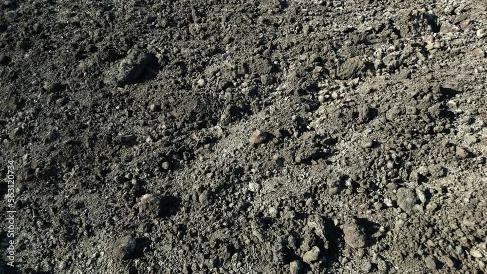 aerial drone view of black lava fields after volcano eruption in volcanic landscape on Lanzarote island in Spain at Canary Islands , Timanfaya national park biosfere reserve Unesco