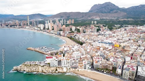 Aerial perspective of Benidorm city center. View of Benidorm Marina and Poniente Beach area with beautiful skyscrapers.  Drone rotating right creating a beautiful panorama of the city. 