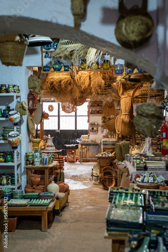 Wallpaper Mural view of store and workshop of pottery and wickerwork, handicrafts, antique crafts, colorful and original gifts.Nijar,Almeria,España Torontodigital.ca