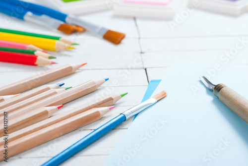 creative hobby tools on white wood