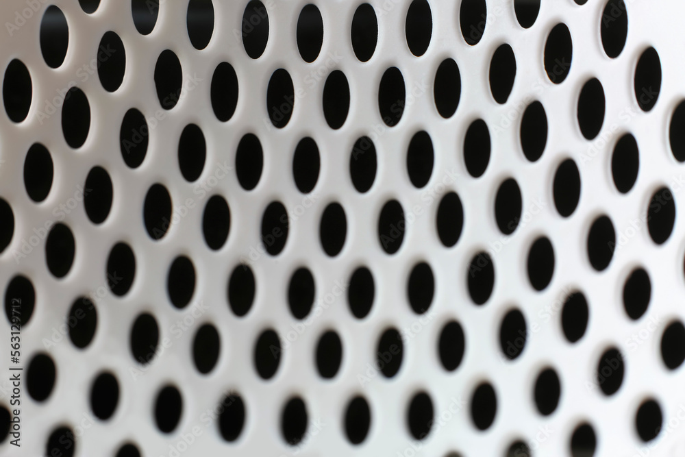Closeup of white concave plastic perforated background Closeup of white concave plastic perforated background