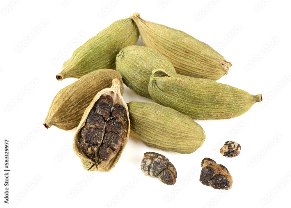 Green cardamom pods and seeds on a white background. Green cardamom pods and seeds on a white background.